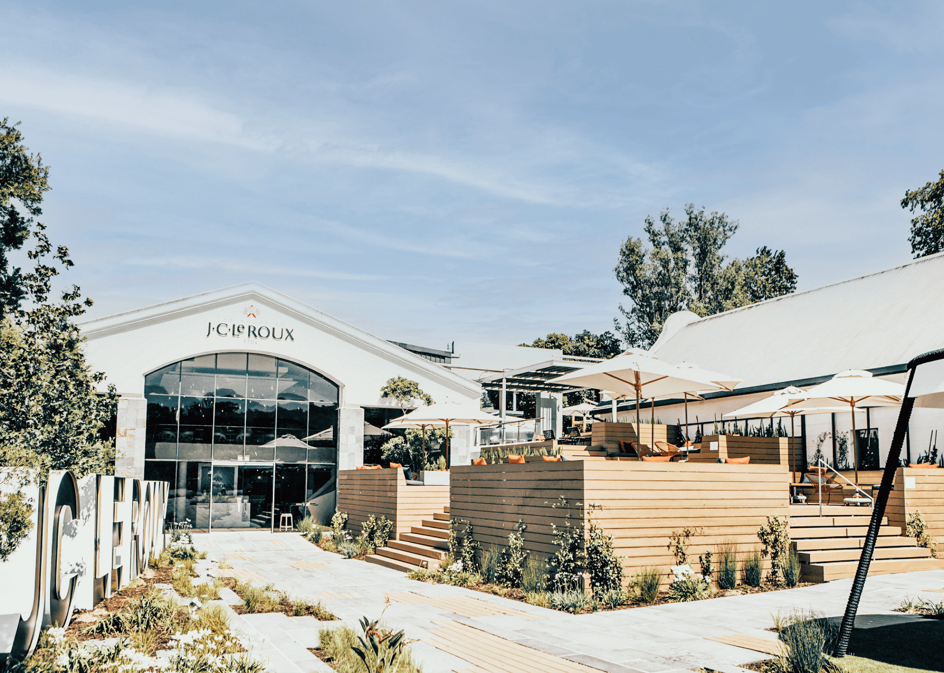 friends celebrating and enjoying jc le roux sparklign wine